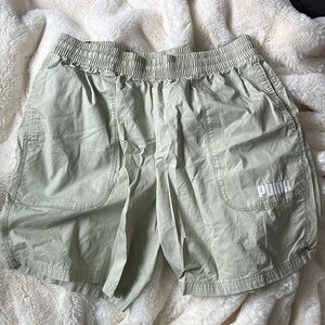 sage green PUMA shorts